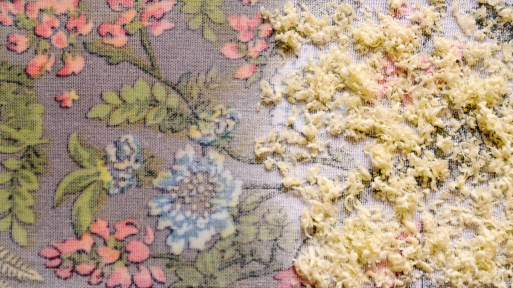 Melt the wax on your Fabric